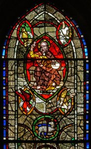 Window depicting Christ in Majesty surrounded by Evangelist symbols by English School