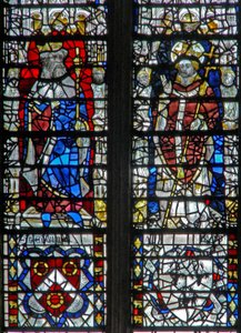 Window depicting figures and shields below by English School