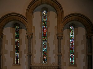 Window depicting the east window with lancets by Fred Weekes and Gualbert Saunders by English School