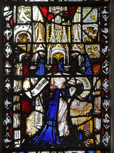 Window n4 depicting a cleric with scroll by English School