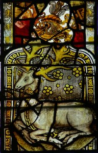 Window 11 depicting a chained deer