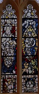 Window depicting St John the Baptist; Woman Clothed with the Sun and with the moon under her feet with the Man-child in the Book of Revelation by English School