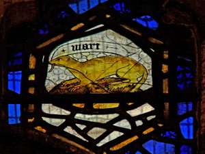 Window depicting an otter
