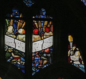 Window depicting the angelic choir singing; angel censing by English School