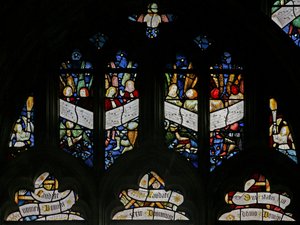 Window depicting tracery lights with musical angels by English School