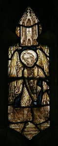 Window depicting a musician angel with a harp by English School