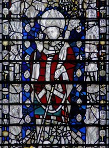 Window depicting St Nicholas; border with figures by English School