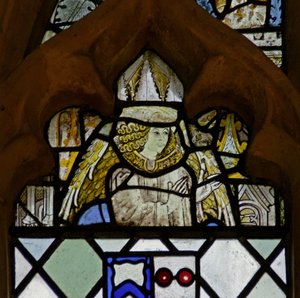 Window w7 depicting an angel by English School