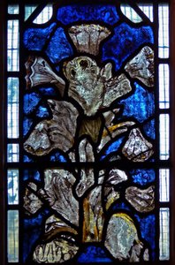 Window depicting the Lily Crucifixion: a fusion of the lily (symbol of the Annunciation) with the Crucifixion