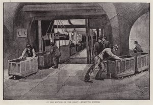 Removing empty coal trucks at the bottom of a mine shaft by Enoch Ward