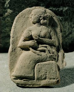 Woman Nursing Her Child
