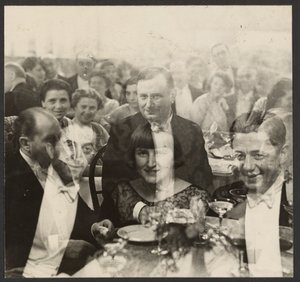 Double Exposure of a Group of People at a Banquet by Erich Salomon