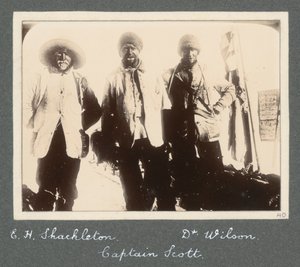 A group photograph of Shackleton, Captain Scott, and Dr Wilson on their return to Discovery from the attempt to reach the South Pole. From album by Sir Ernest Henry Shackleton entitled National Antarctic Expedition (1901-1903) by Ernest Henry Shackleton
