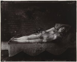 Female Nude on a Chaise Longue by Ernest James Bellocq