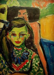 Franzi in front of a carved chair