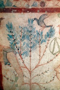 A bird sitting on a small tree (detail)