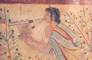 Etruscan art: a flute player (detail) by Etruscan