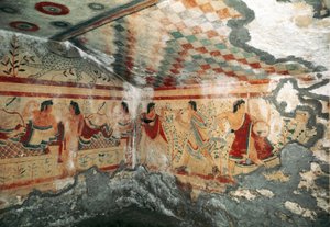 Etruscan art: view of the interior of the tomb of the Leopards decorated with frescoes representing a banquet scene with dancers. 470 BC. Necropolis of Monterozzi, Tarquinia, Italy