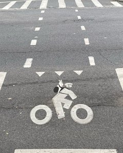 Bike Lane Signage On Street by Evan Sklar