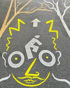 Cyclist and Signage, c.2020-24 by Evan Sklar