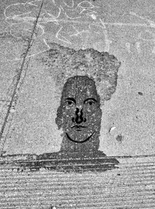 Face On Sidewalk