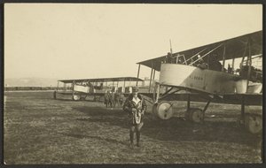 Man in Front of Airplane