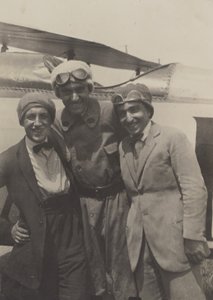 Portrait of Three Men Smiling in Front of an Airplane by Fedele Azari