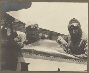 Two Pilots in Airplane by Fedele Azari