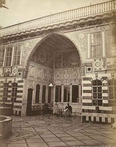Interior of a Jewish House in Stambouli, Syria. Two Women are Shown Under a Portico by Félix Bonfils