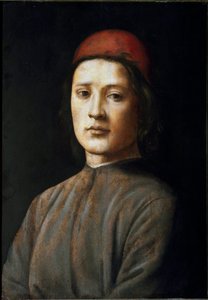 Portrait of a young man with a red hat