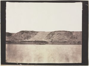 General View of Monuments Carved into Bedrock with Photographer