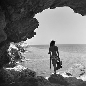 Bather on the Cliff Looking Down at the Sea near the Village of Aspra, near Palermo, Sicily, ca 1950