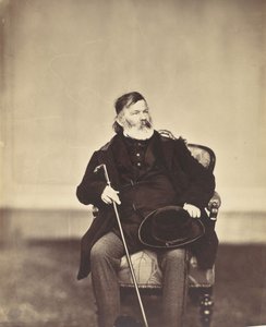 Seated Man with Cane and Hat
