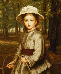A Young Girl Playing with a Hoop