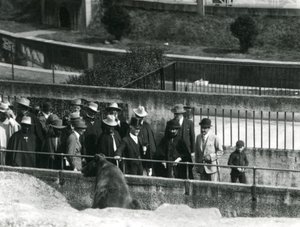 Sir Peter Chalmers Mitchell with Ethiopian Regent Haile Selassie and his entourage viewing a Brown Bear at London Zoo, 1924 by Frederick William Bond