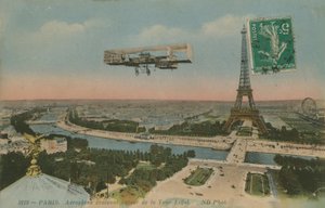 Aeroplane circling around the Eiffel Tower in Paris, France by French Photographer