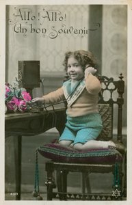Child using telephone by French Photographer