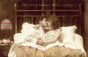 Couple Kissing in Bed