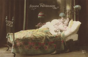 Couple kissing in bed
