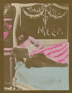 Lina, girl on bed reading newspaper by French Photographer