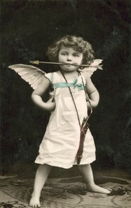 Small Boy, Dressed as Cupid, with an Arrow in His Mouth by French Photographer