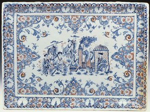 A Rouen rectangular tray, painted in blue and iron-red by French School