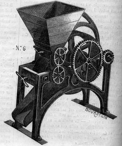 Agricultural machine: an applatizer used to prepare animal feed