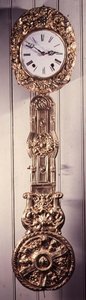 Comptoise clock with pressed brass surround to the dial, (detail)