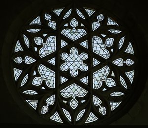 The rose window on the east wall of the south transept by French School