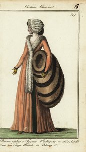 Fashionable woman with huge fur muff