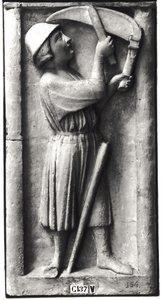 Peasant sharpening his scythe for the haymaking, representing the month of June, from the Portal of the Virgin on the West Facade