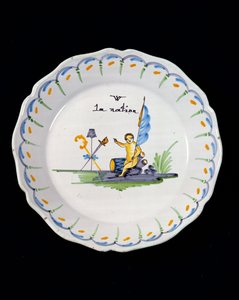 Plate Decorated with a Genie Sitting on a Drum, and the Three Orders of The Nation