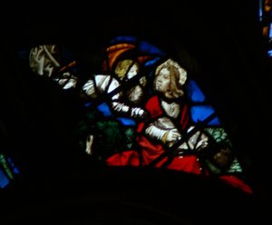 The west rose window depicting a scene from the Book of Revelation: Opening the seventh seal