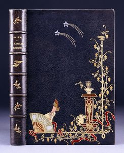 Upper book cover of two shooting-stars, a torch, foliage, faun on pedestal, putto and a leg behind a fan, 1893